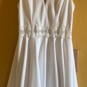 B. Smart Ivory Dress with Delicate Accents